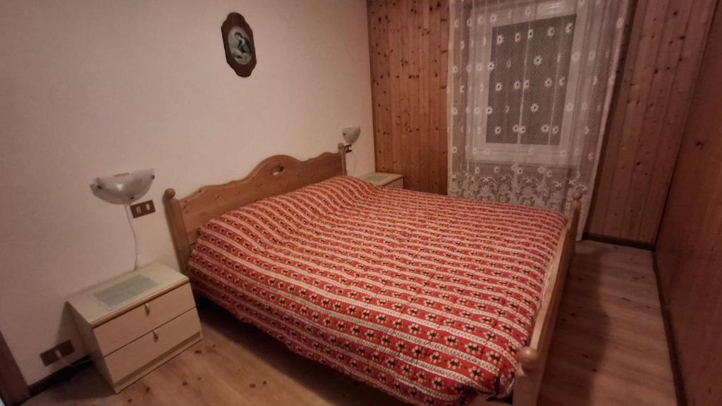 Postel nebo postele na pokoji v ubytování Residence Marmolada