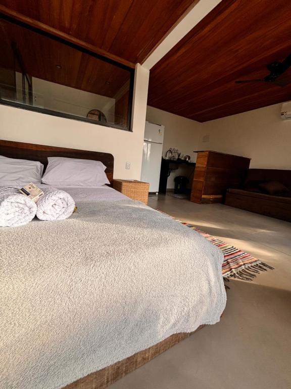 Postel nebo postele na pokoji v ubytování Flats Praia Comprida