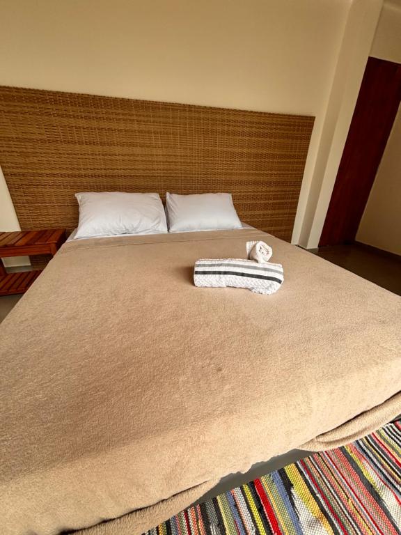 Postel nebo postele na pokoji v ubytování Flats Praia Comprida