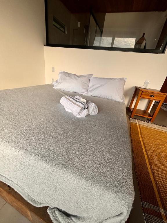 Postel nebo postele na pokoji v ubytování Flats Praia Comprida