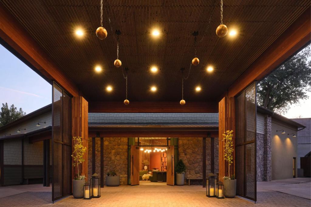 an external view of a house with lights on the ceiling at The Red Cliffs Lodge Zion, a Tribute Portfolio Hotel in Springdale
