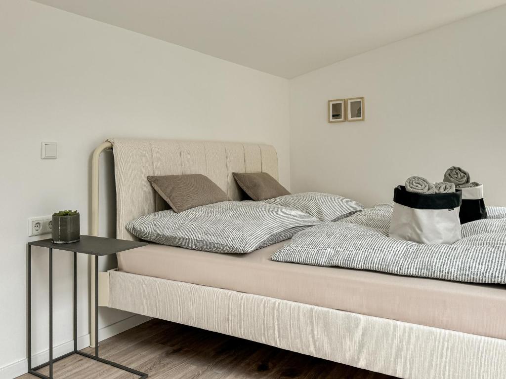 Postel nebo postele na pokoji v ubytování Scandi Micro House