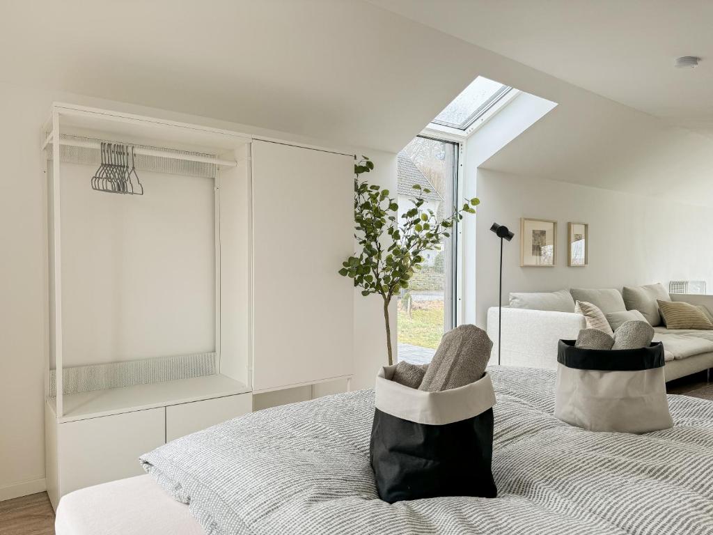 Postel nebo postele na pokoji v ubytování Scandi Micro House