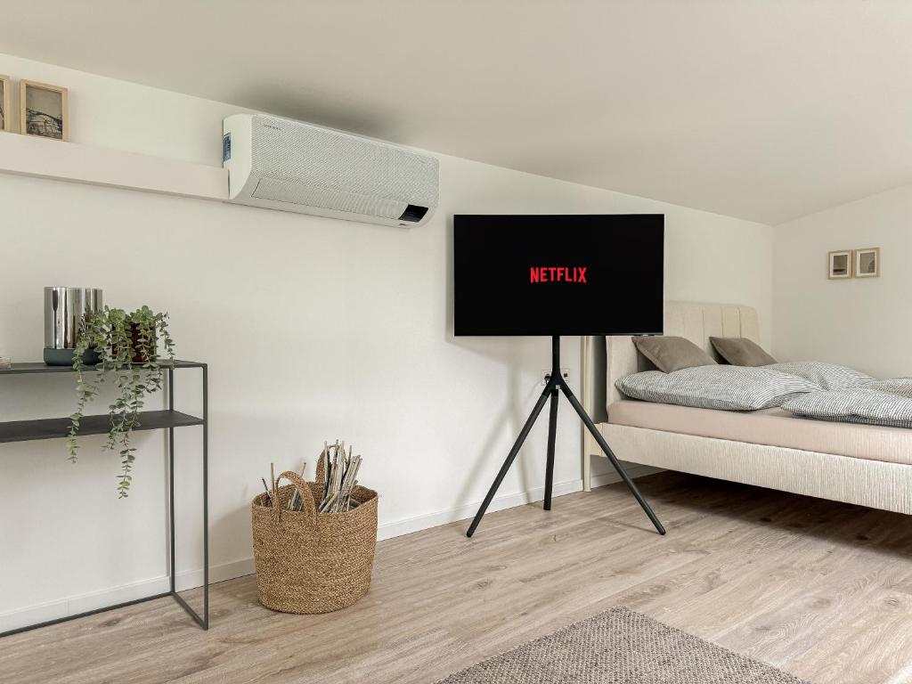Postel nebo postele na pokoji v ubytování Scandi Micro House