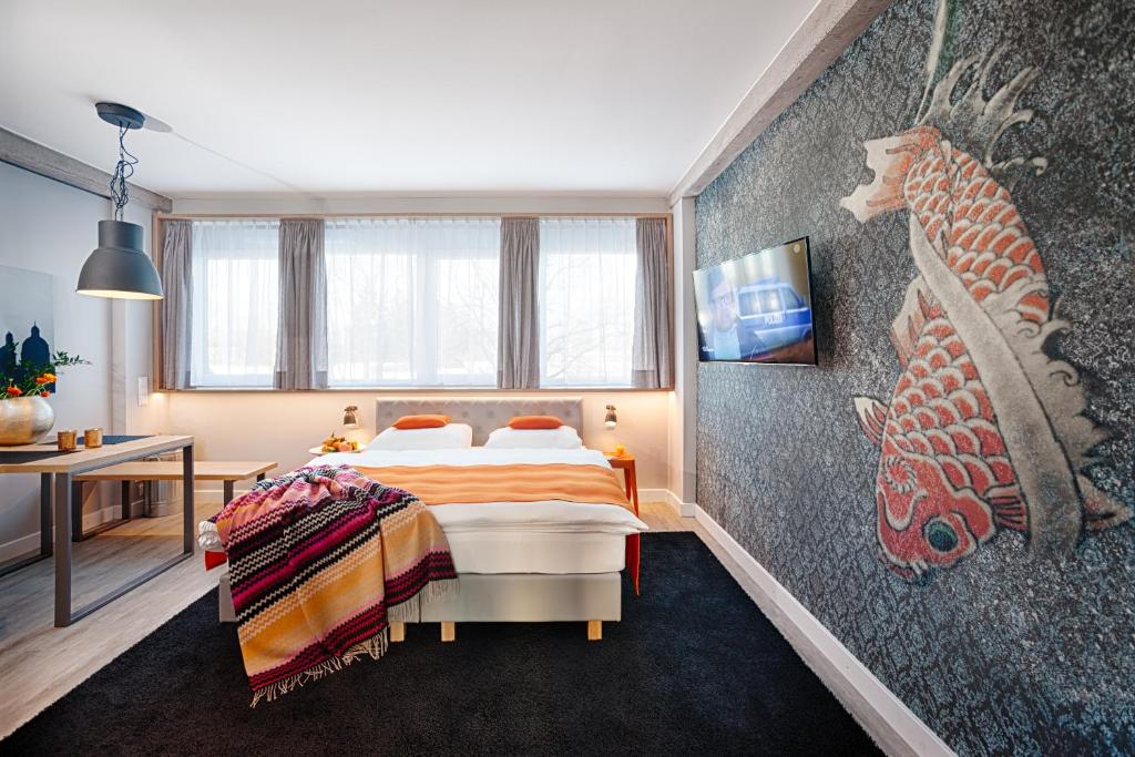 Postel nebo postele na pokoji v ubytování MLOFT Apartments München