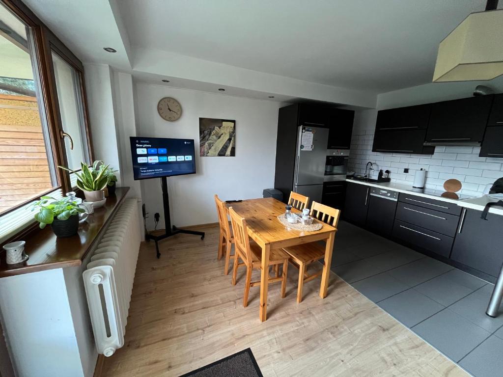 Kuchyň nebo kuchyňský kout v ubytování Apartament MATI