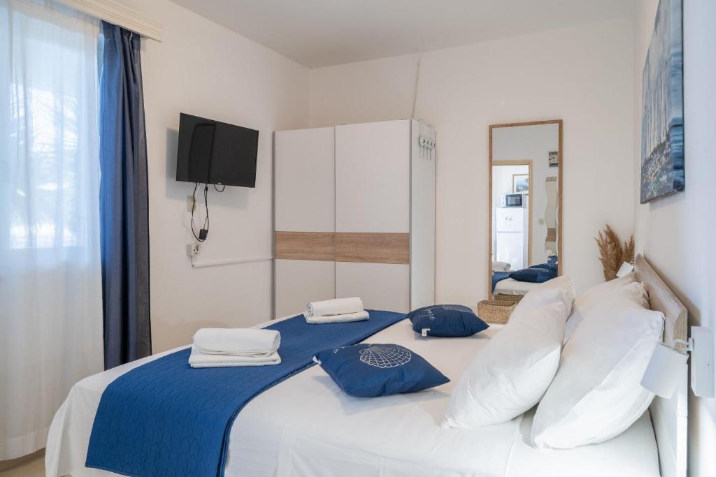 Кровать или кровати в номере Apartments Ranko