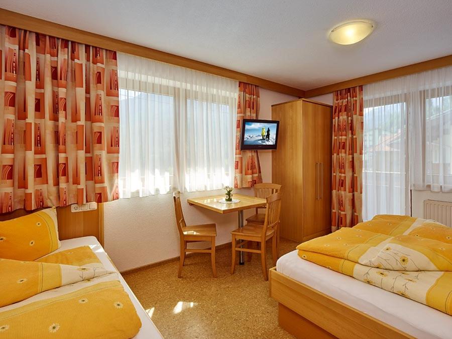 Postel nebo postele na pokoji v ubytování Haus Gritsch