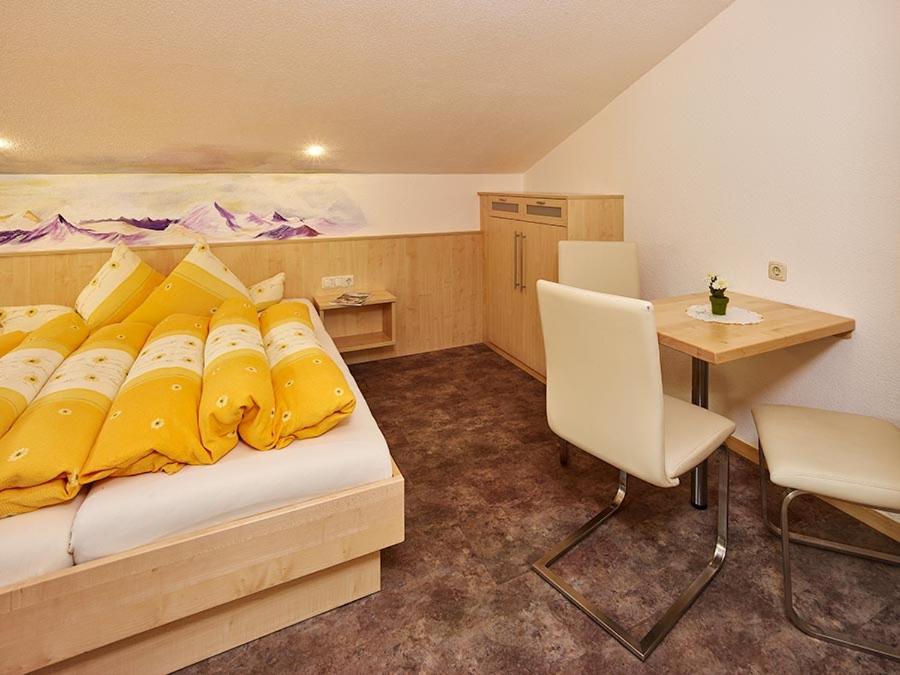 Postel nebo postele na pokoji v ubytování Haus Gritsch