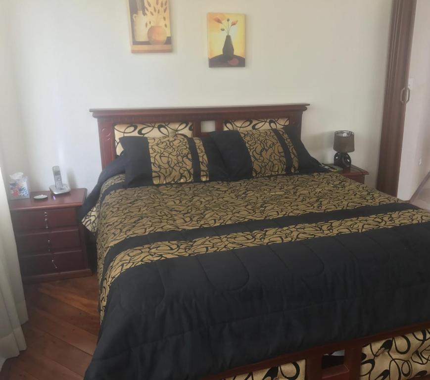 Postel nebo postele na pokoji v ubytování Altura Rooms & Suites