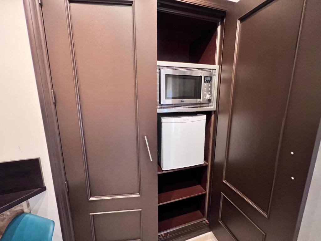 Kuchyň nebo kuchyňský kout v ubytování Hotel Don Juan