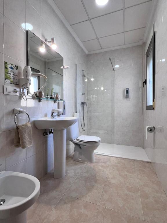 Koupelna v ubytování Hotel Don Juan