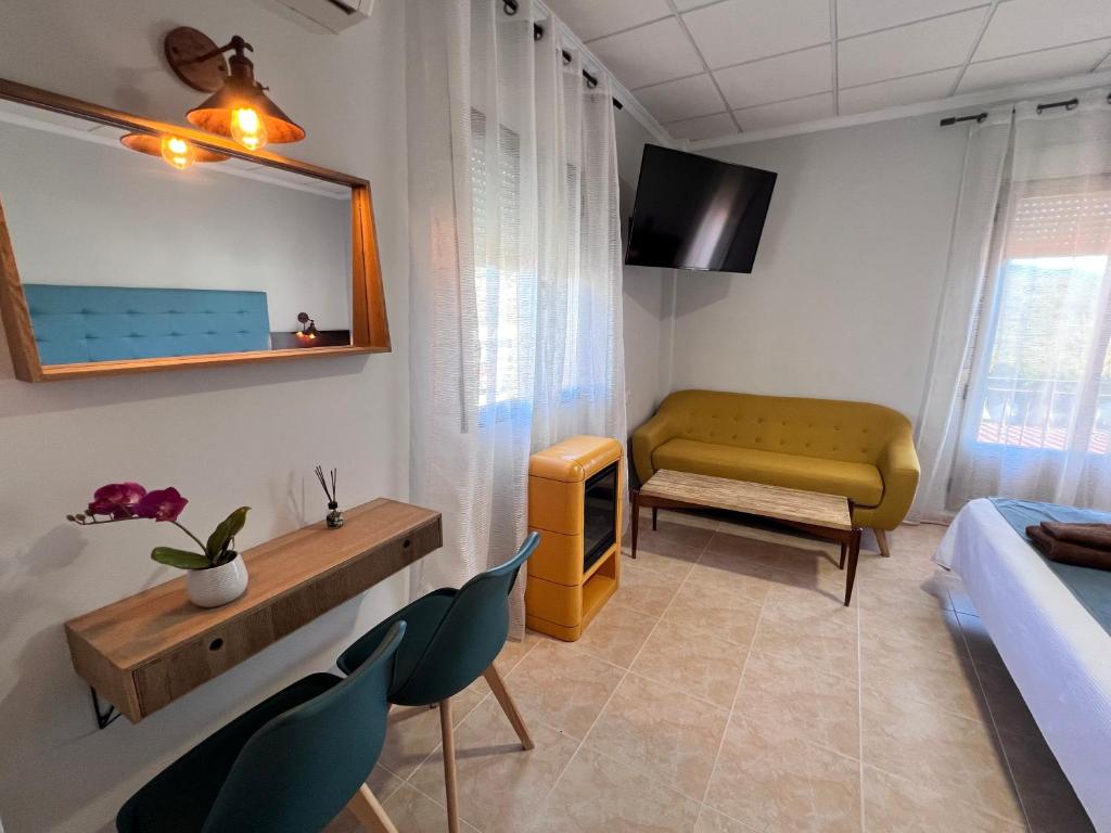 TV a/nebo společenská místnost v ubytování Hotel Don Juan