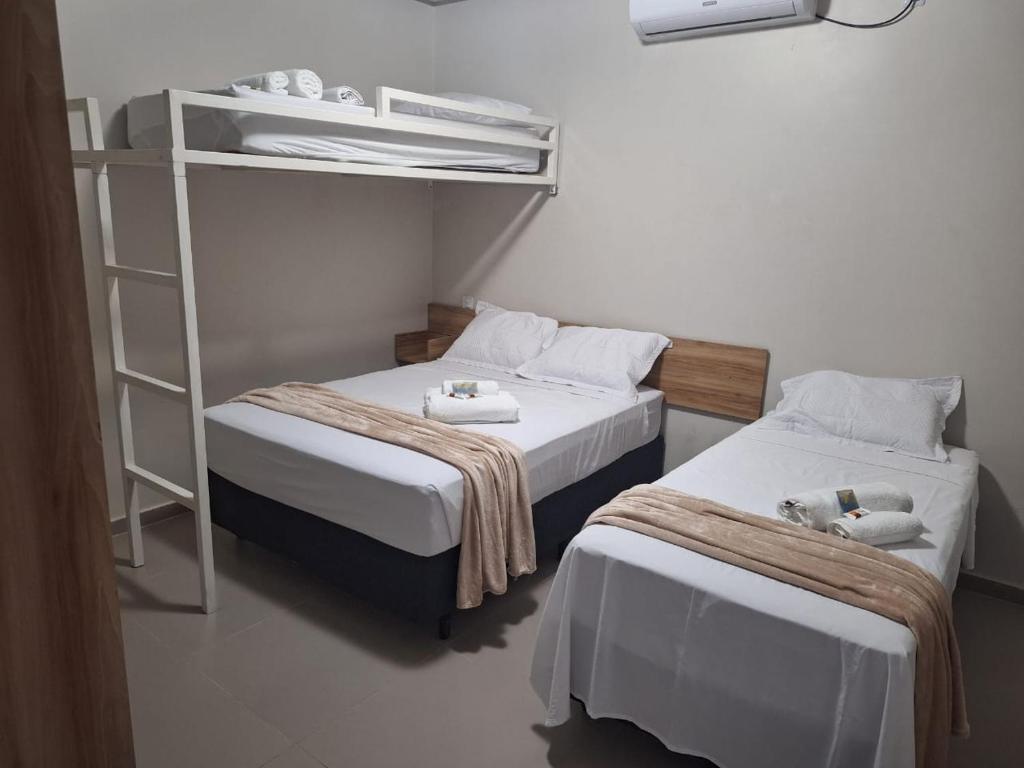 Postel nebo postele na pokoji v ubytování Pousada Lua Rosa
