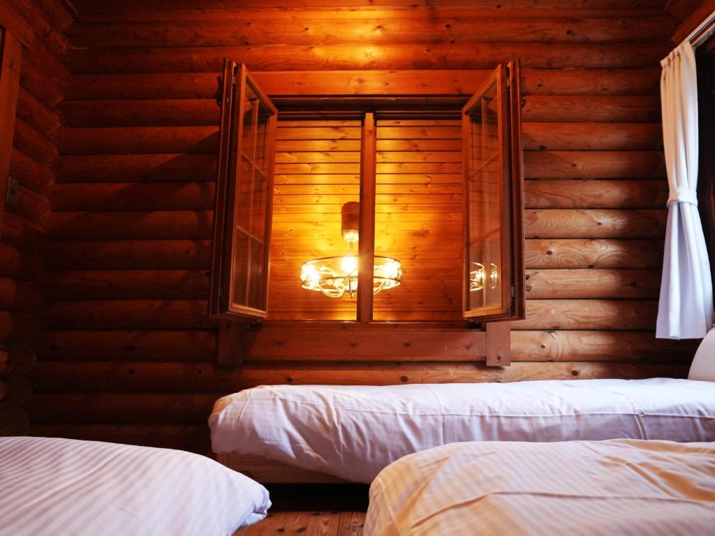 Postel nebo postele na pokoji v ubytování green bell
