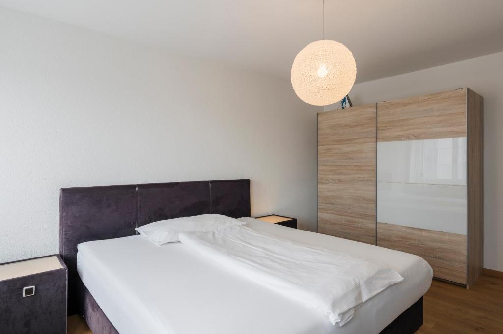 Postel nebo postele na pokoji v ubytování Amanthos Living Solothurn