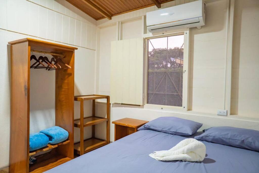 Postel nebo postele na pokoji v ubytování Hospedaje Rancho mi Tata