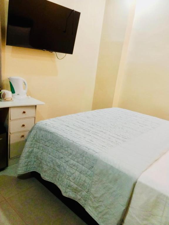 Postel nebo postele na pokoji v ubytování Serena Rooms