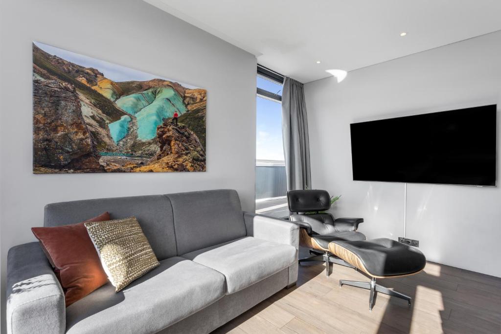 TV a/nebo společenská místnost v ubytování ALVA Apartments