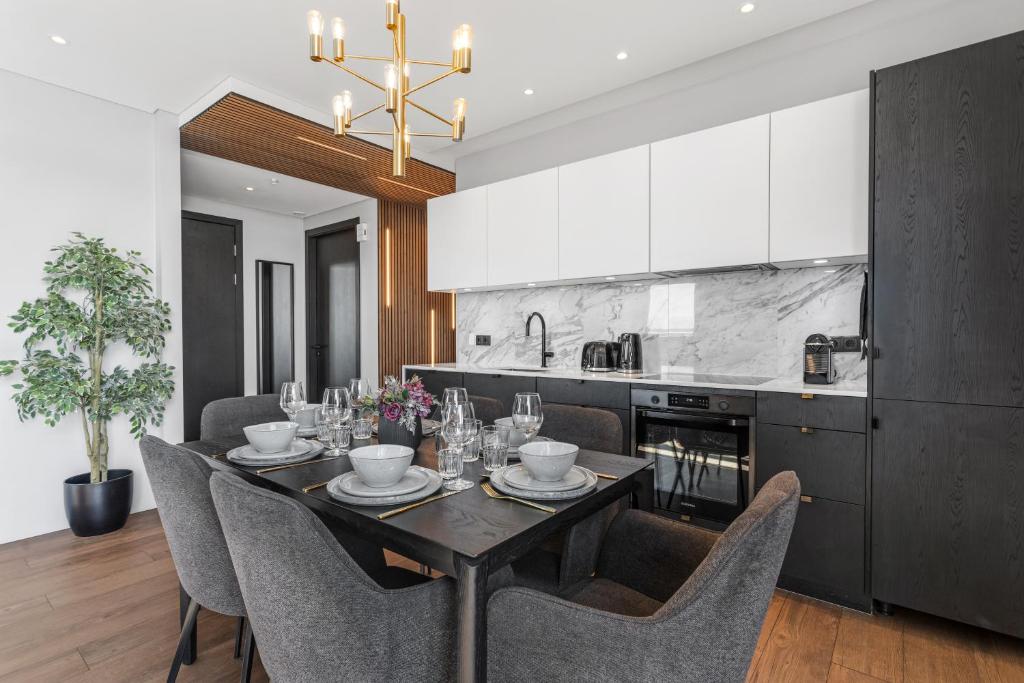 Kuchyň nebo kuchyňský kout v ubytování ALVA Apartments
