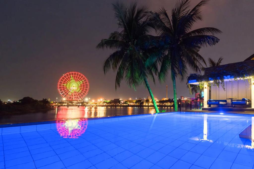 Bazén v ubytování THE BLOSSOM RESORT ISLAND DA NANG - Onsen Included nebo v jeho okolí