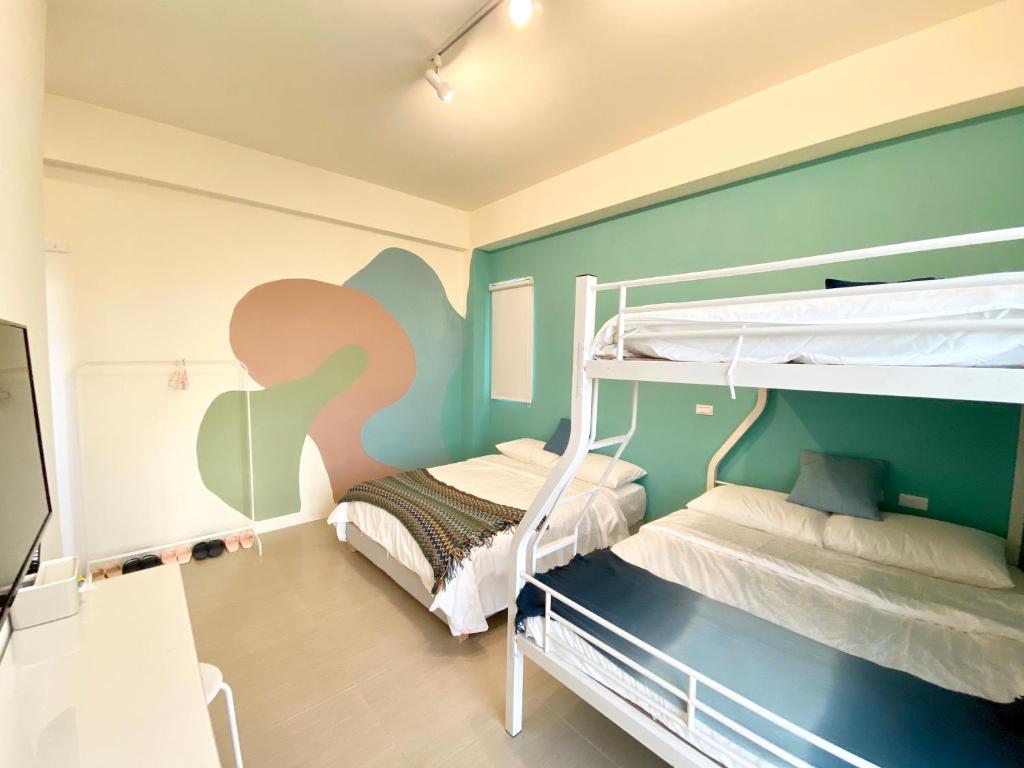 Postel nebo postele na pokoji v ubytování Pinky Promise Villa