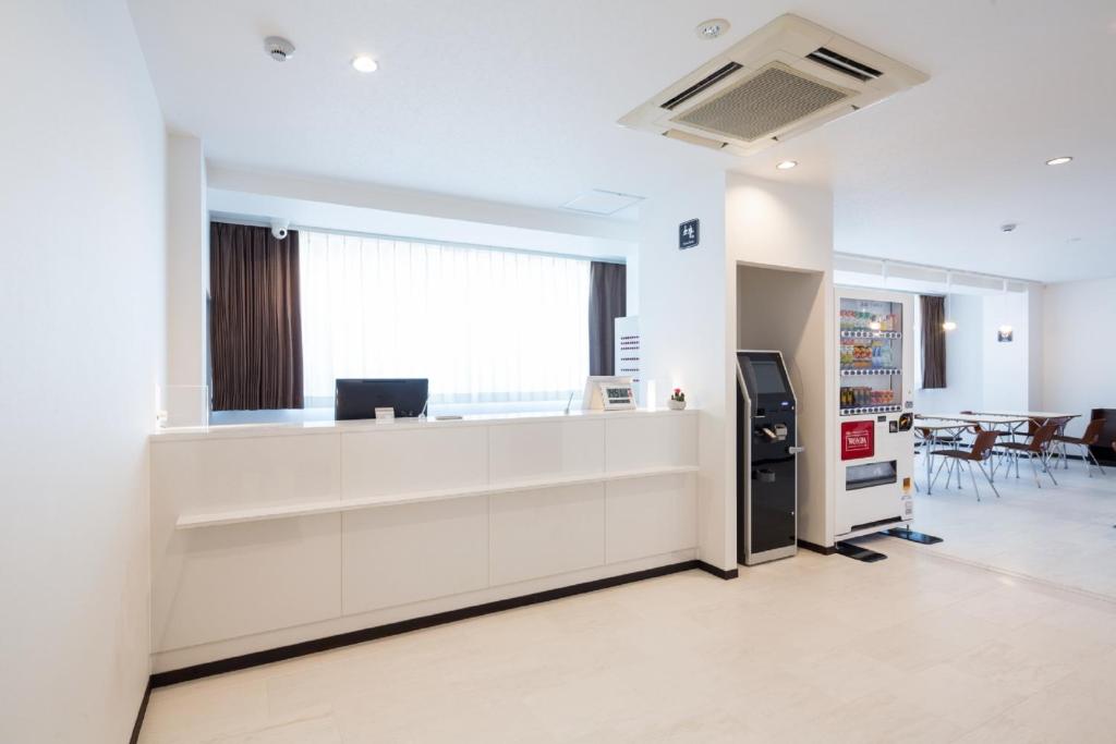 TV a/nebo společenská místnost v ubytování Capsule Hotel Cube Hiroshima