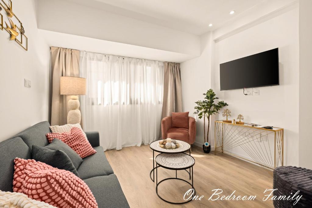 TV a/nebo společenská místnost v ubytování Lazuli Hermes Apartments