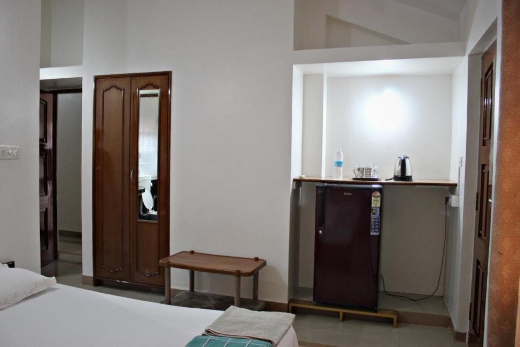 Postel nebo postele na pokoji v ubytování Minria Guest House