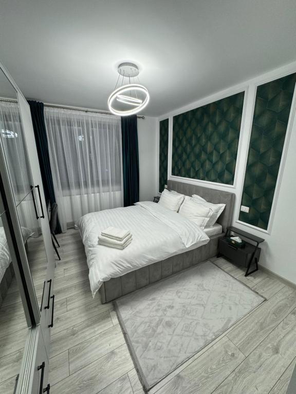 Ένα ή περισσότερα κρεβάτια σε δωμάτιο στο DMluxury