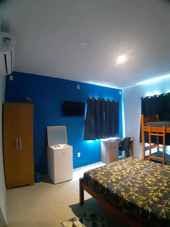 Postel nebo postele na pokoji v ubytování Vida Linda Hostel