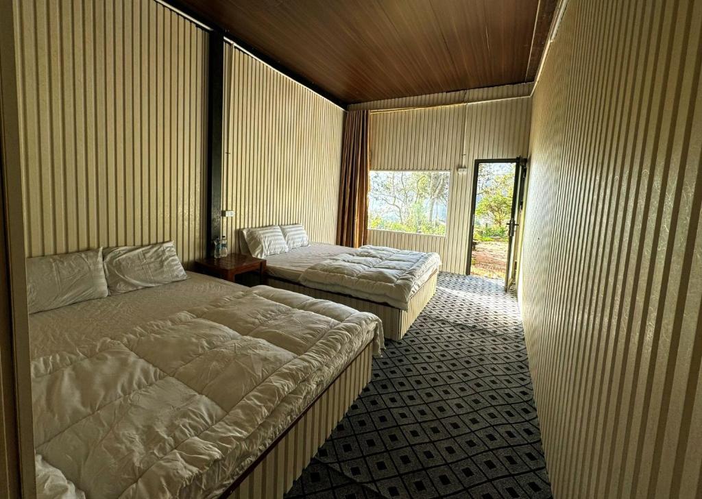 Postel nebo postele na pokoji v ubytování Tà Xùa Casablanca Homestay
