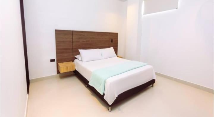 Postel nebo postele na pokoji v ubytování Hotel Luna Verde