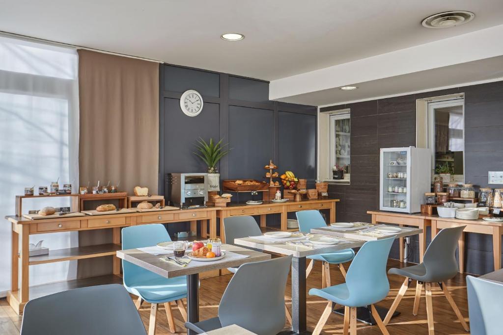 Restaurace v ubytování Appart'hôtel Odalys City - Bioparc Lyon Est