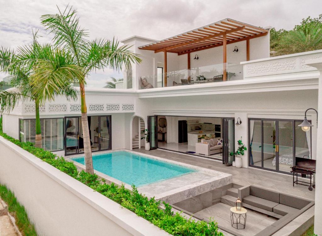 an image of a house with a swimming pool at Bang Tao Villa - Menara Hill in Phuket Town