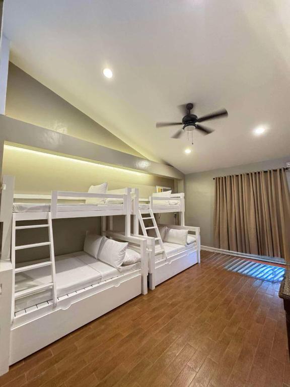 Postel nebo postele na pokoji v ubytování Red Coco Inn de Boracay