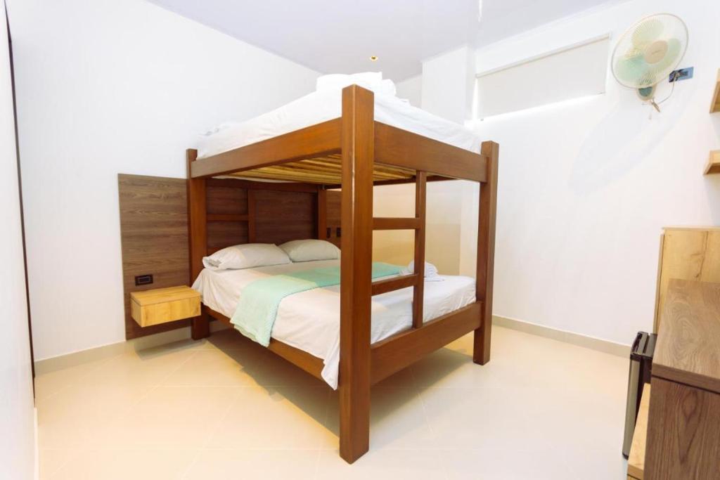 Postel nebo postele na pokoji v ubytování Hotel Luna Verde