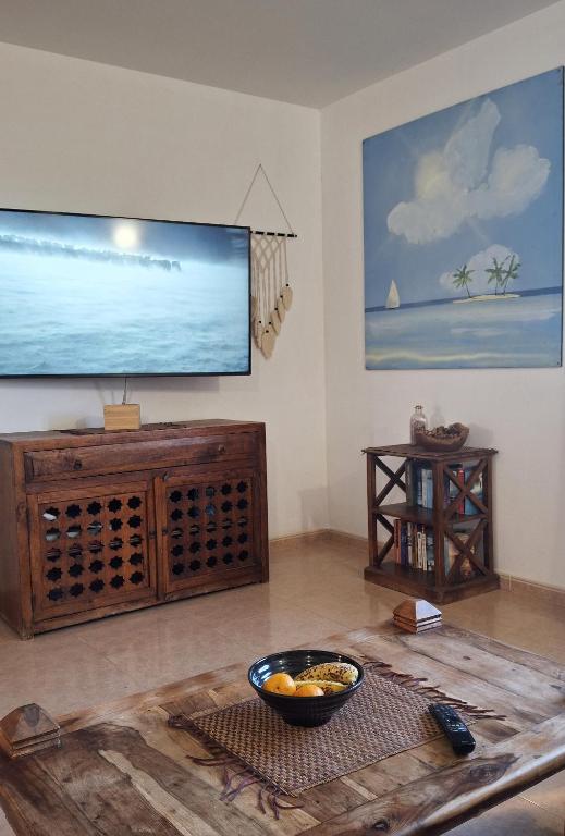TV a/nebo společenská místnost v ubytování Apartment Gardenia, Oasis Tamarindo