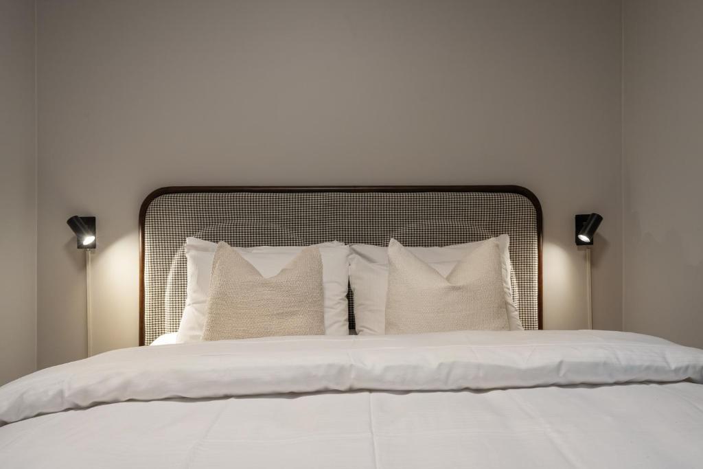 Enter Skansen Hotelにあるベッド