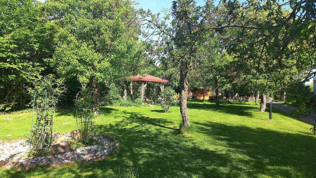 a park with a gazebo in the grass at Ferienwohnung Margit in Sulzfeld (im Grabfeld)