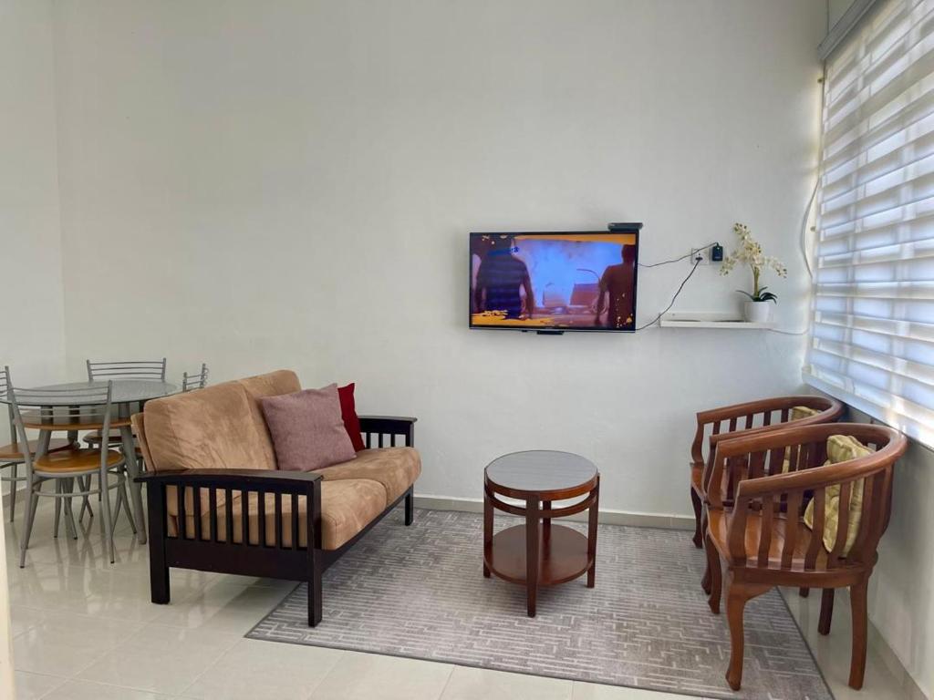 TV/trung tâm giải trí tại Rumah Kami Homestay
