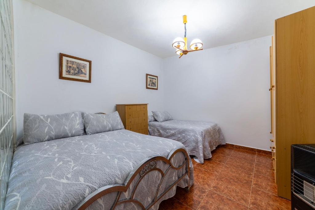 Postel nebo postele na pokoji v ubytování Casa rural Mccoy 2
