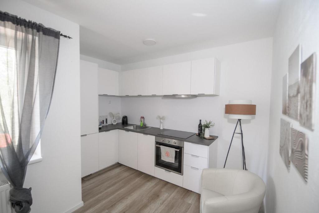 Kuchyň nebo kuchyňský kout v ubytování Ferienwohnung Nußbaumer