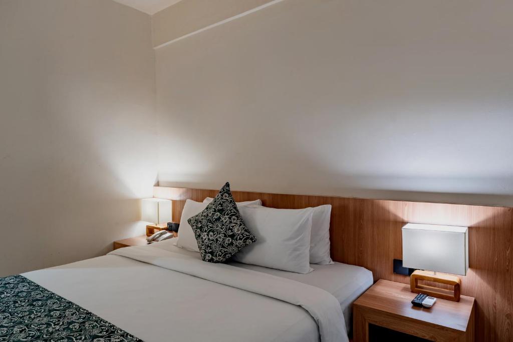 Postel nebo postele na pokoji v ubytování Tusita Boutique Hotel