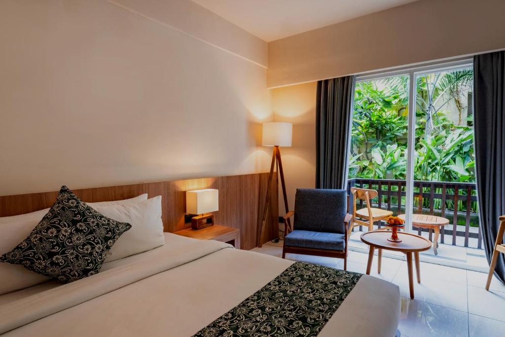 Postel nebo postele na pokoji v ubytování Tusita Boutique Hotel