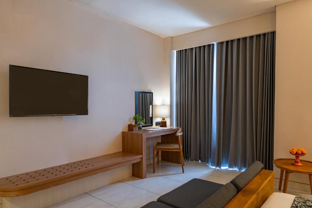 TV a/nebo společenská místnost v ubytování Tusita Boutique Hotel