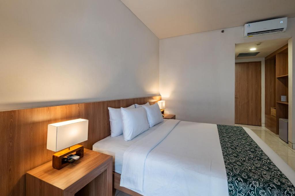 Postel nebo postele na pokoji v ubytování Tusita Boutique Hotel