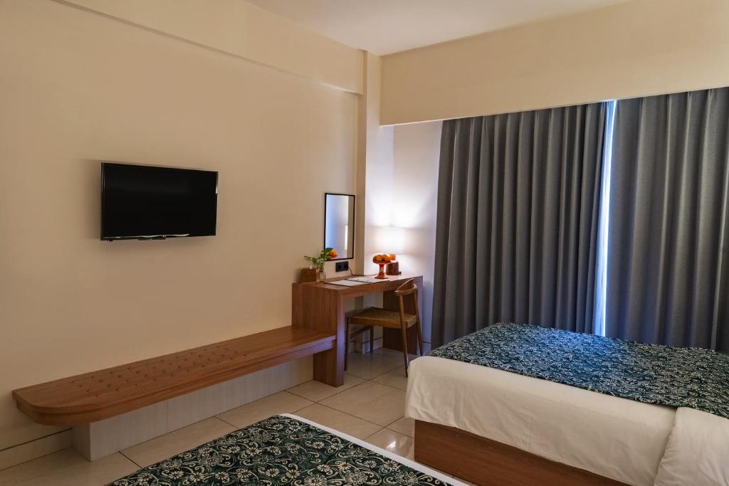 Postel nebo postele na pokoji v ubytování Tusita Boutique Hotel