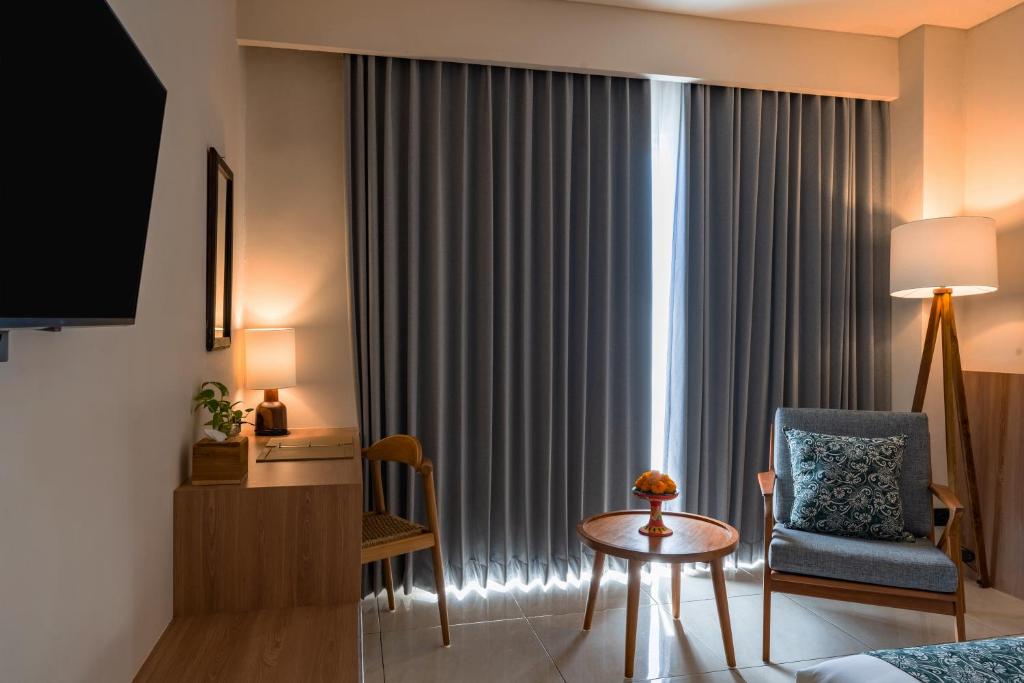 TV a/nebo společenská místnost v ubytování Tusita Boutique Hotel