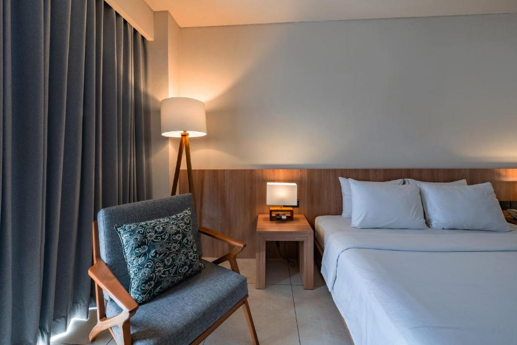 Postel nebo postele na pokoji v ubytování Tusita Boutique Hotel